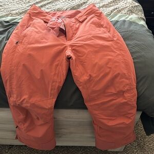 Women’s snowboarding pants… size medium-short length . Color is coral